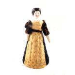 A Victorian porcelain shoulder plate doll with solid fabric body