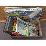 A pine trunk containing boxed games plus a case of Scalextric
