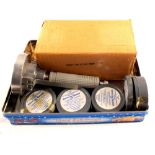 A boxed Webley & Scott target launcher with original paperwork and four tins of .