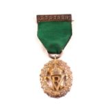 A Victorian silver Volunteer Officers decoration with ribbon and oak leaf bar brooch,