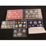 An album of GB cased set 1962-7 and 1969 New Zealand Cook commemorative plus three others