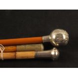 Three swagger sticks including a London Scottish example