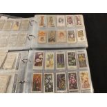 Three albums of cigarette and trade cards