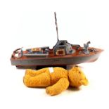 A model gun boat plus a teddy bear