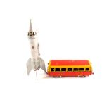A die cast VSAF rocket money box by Astro MFG Co plus a European tin plate tramcar in red and