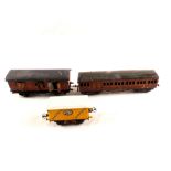 A Hornby Fyffes Bananas wagon plus two 0 gauge carriages