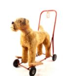 A Pedigree Soft Toys Ltd push along dog plus a Fisher Price circus train set