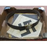 A German WWII (PATTERN) belt with Luftwaffe propaganda book and pennant