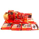 Boxed Hornby railways items to include engine sheds, R003 town station goods shed,