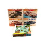 Four boxed Matchbox car kits, American modified Ford, Eckler Corvette,