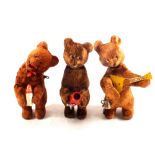 Three Russian clockwork felt clad bears