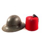 A British WWII era helmet with a fine quality FEZ