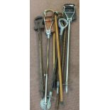 A collection of shooting sticks and walking sticks