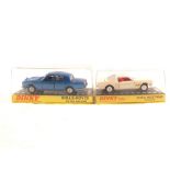 Two hard plastic boxed Dinky Toys,
