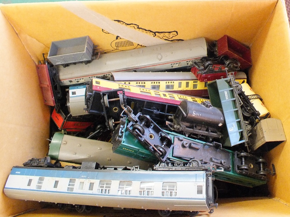 A large quantity of Triang and Hornby 00 and 0 gauge rolling stock etc