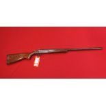 A model 84 S/B 12 bore shotgun by Cooey (Canada) S/No.