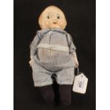 A composition dressed doll, Campbells Kid,