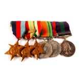 A mounted for wear group of five WWII medals, 39-45 Star, Africa Star with clasp, Italy Star,