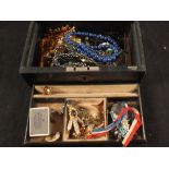 A jewellery box with costume jewellery including necklaces, earrings,