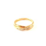 A 9ct gold diamond crossover ring,