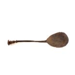 A 16th Century bronze seal top spoon, the tear shaped bowl with traces of makers mark,