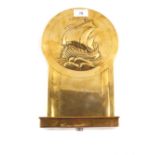 An Arts and Crafts brass wall sconce, the back plate embossed with galleon sailing in rough seas,