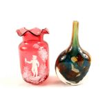 A Mary Gregory cranberry glass vase plus a Mdina narrow neck vase