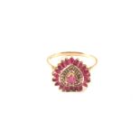 A 9ct gold ruby and diamond cluster ring of heart form,