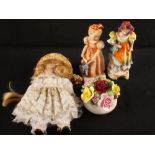 A Goebels figurine of a girl and child plus one other,