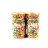 A pair of Cantonese figure decorated reticulated vases,