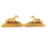 A pair of brass greyhound mantel piece ornaments