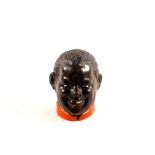 A painted pottery ethnic boy bust