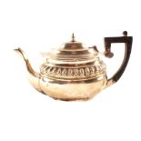 A silver teapot (as found)