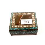 A small eastern box with crushed turquoise inlay and hand cut crystal and a predominantly agate lid