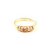 An 18ct gold five stone diamond ring,