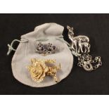 A costume brooch marked Christian Dior, a pair of costume earrings Vivienne Westwood,