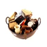 A Victorian copper jam pan containing figurines,