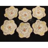 A set of six Italian polychrome floral shaped edge plates