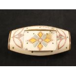 A blonde horn snuff box with geometric designs