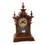 A German carved pine mantel clock