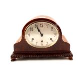 An oak cased German movement mantel clock