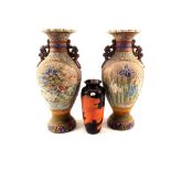 A pair of 19th Century Japanese floral vases plus a black lacquer vase (as found)