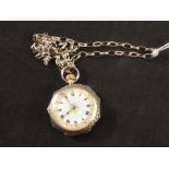 A lady's silver fob watch and chain