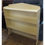 A white painted three shelf dresser back