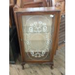 A mahogany shaped front display cabinet with glazed door and painted front