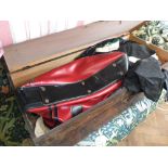 A pine storage box with contents including vintage tennis racquets,