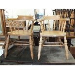 A pair of elm elbow chairs and a pine cheval mirror