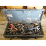 A tool chest containing various large spanners and tools