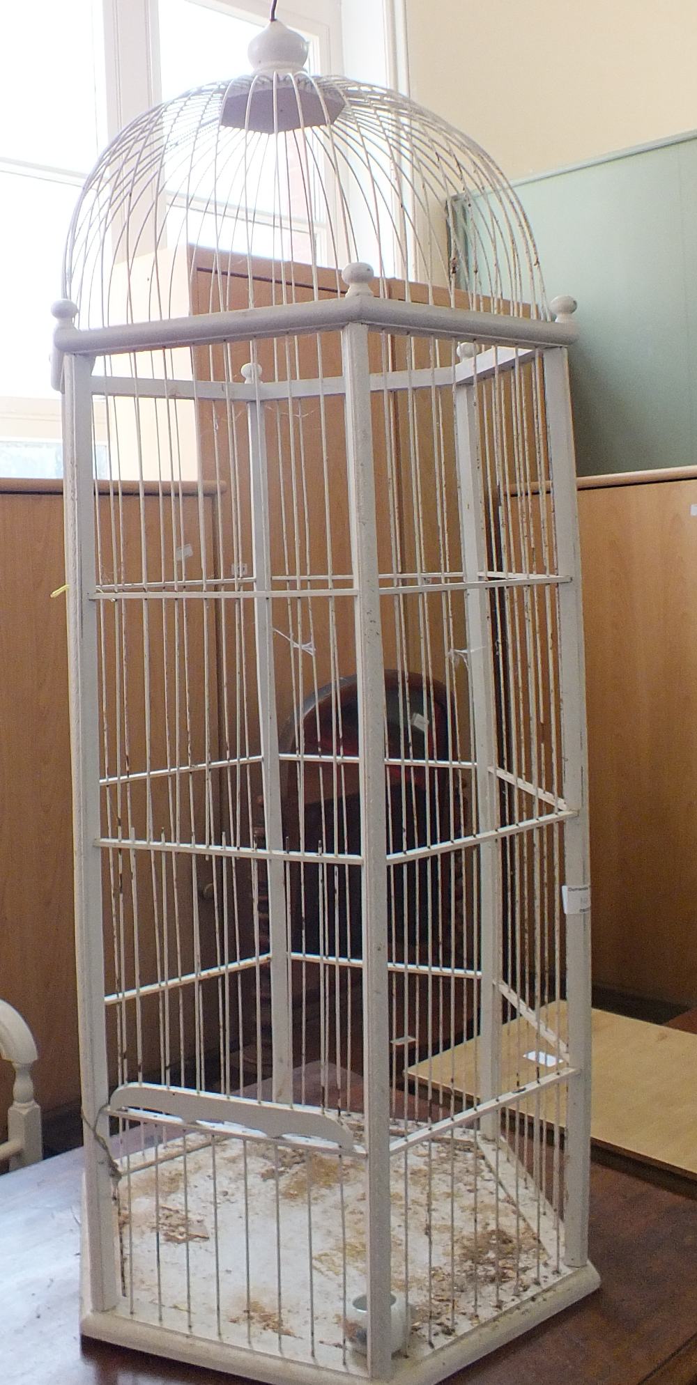 A white painted bird cage (height 41") and an antique pine stool