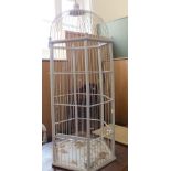 A white painted bird cage (height 41") and an antique pine stool